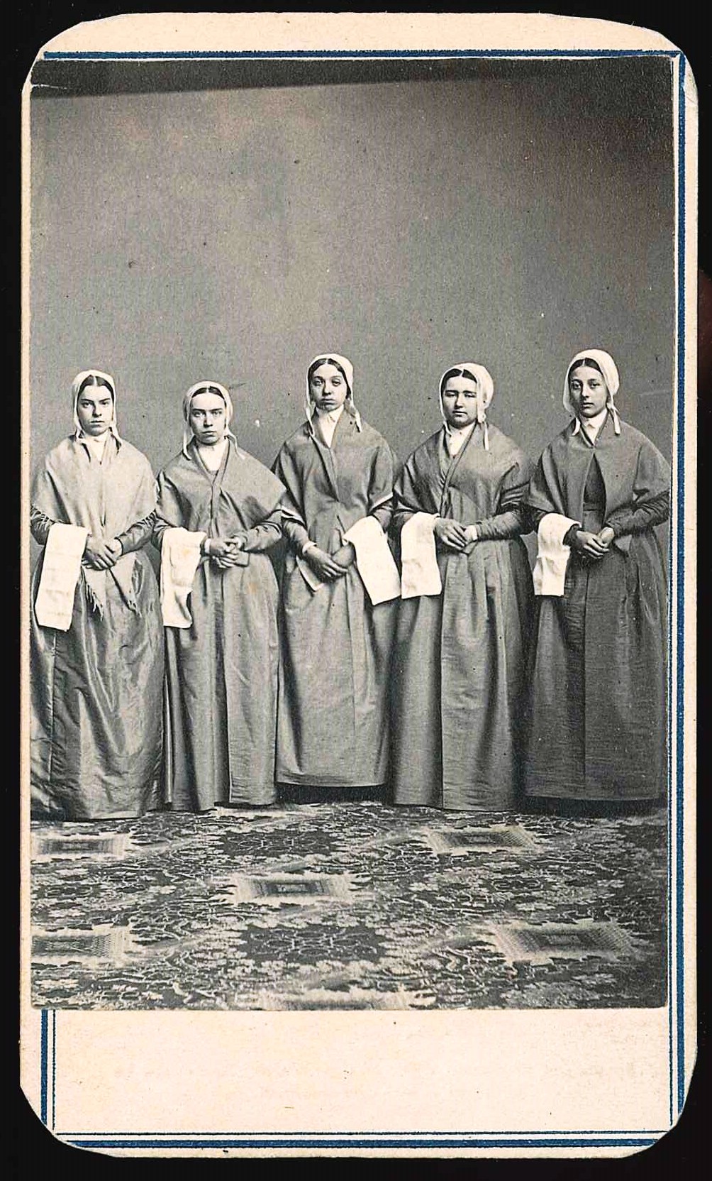 A group of women in a black and white photo.