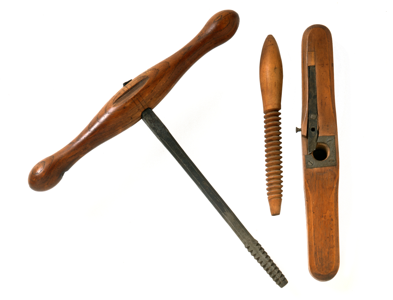 A pair of wooden tools on a white background.