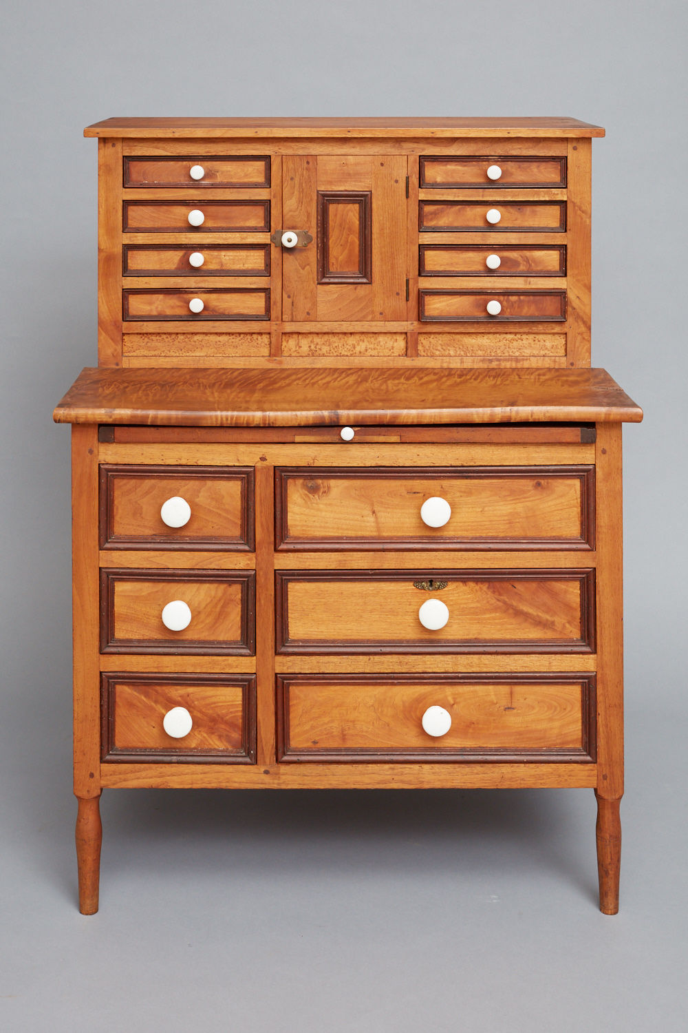 A wooden desk with drawers and drawers.