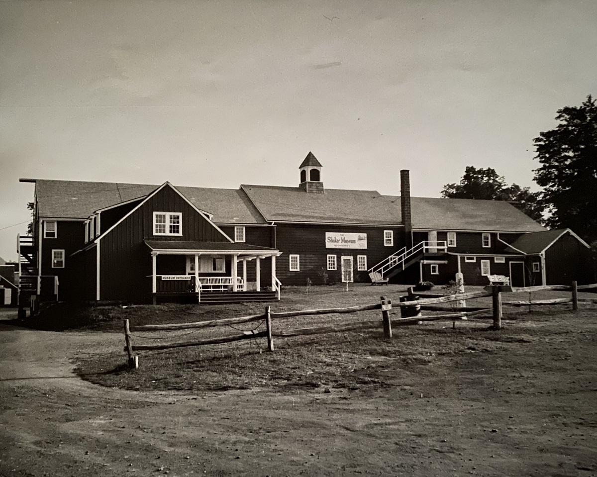 An old black and white photo of a farm.